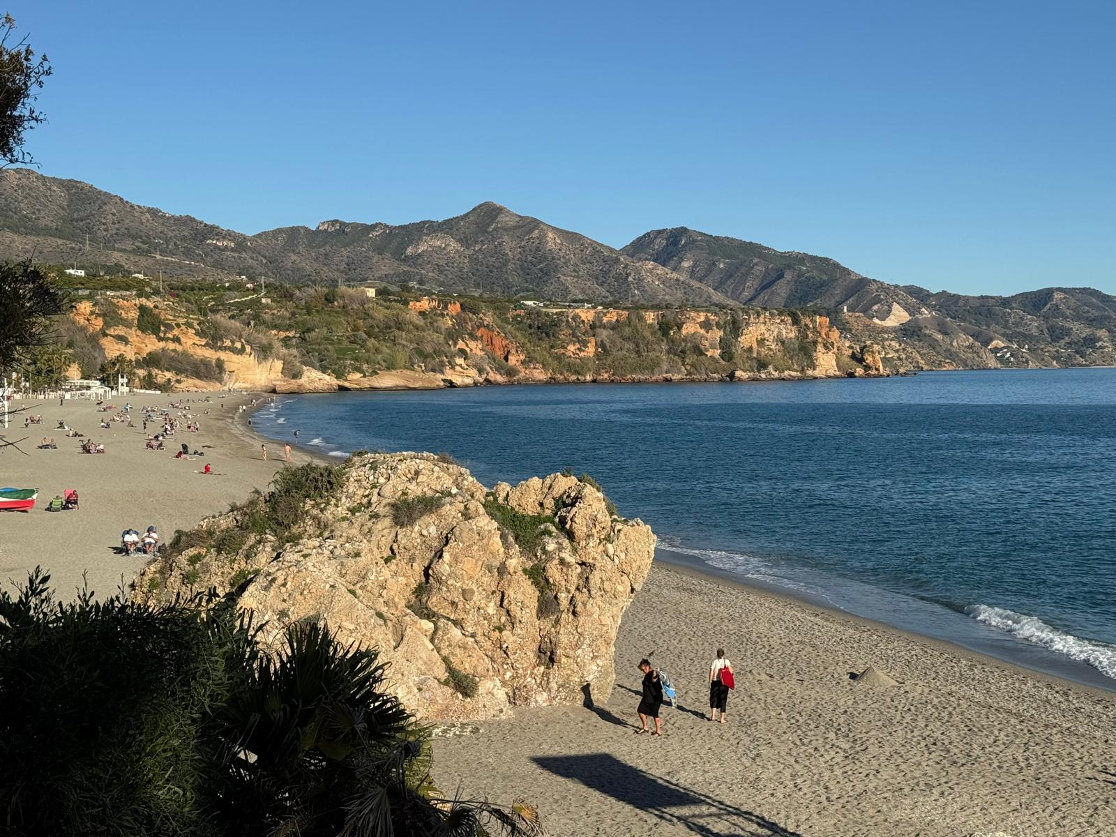 Burriana Beach with cliffs and mountains behind
